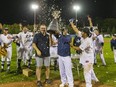 London Majors co-owners Scott Dart, left, and Roop Chanderdat hold the Intercounty Baseball League championship trophy after the Majors defeated the Toronto Maple Leafs 8-4 in Game 5 Friday, Oct. 1, 2021, at Labatt Park. Chanderdat has been named the league's manager of the year. (Mike Hensen/The London Free Press)