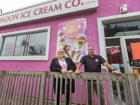 Karen Minielly and Abbi Lezizidis of the London Ice Cream Co. pose with their iconic pink wall at their small Base Line Road location. (Mike Hensen/The London Free Press)