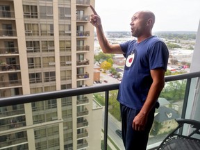 George Clarke was sitting on the balcony of his unit on the 16th floor of an apartment building at 400 Lyle St. on Saturday when he saw what he thought was a doll fall from a unit above his. He later learned he had witnessed a 22-month-old girl plunge to her death from a balcony on the building's 20th floor. (Mike Hensen/The London Free Press)