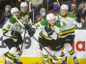 Colton Smith of the London Knights heads to the bench after scoring the first goal of the game against the Windsor Spitfires on Friday, Oct. 15, 2021, at Budweiser Gardens in London. The Knights won that game 5-1 and beat the Sarnia Sting in overtime Saturday in Sarnia, giving them a five-game winning streak to start the season. (Mike Hensen/The London Free Press)