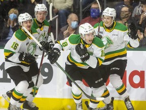 Colton Smith of the Knights heads to the bench after scoring the first goal of the game against the Windsor Spitfires on Friday October 15, 2021. (Mike Hensen/The London Free Press)