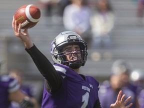 Western Mustangs QB Evan Hillock slings a pass during their OUA football game against the Windsor Lancers on Oct. 16, 2021 at Alumni Stadium. (Mike Hensen/The London Free Press)