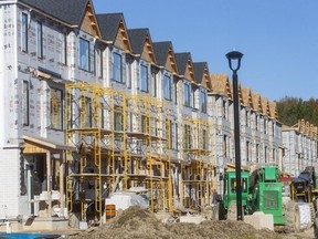 London's northwest Foxwood subdivision is growing by leaps and bounds at Sunningdale and Hyde Park in London. Row housing and single family dwellings are both under construction. Photograph taken Monday, Oct. 18, 2021. (Mike Hensen/The London Free Press)