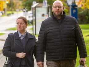 Herbert Hildebrandt and his wife walk into court at the Elgin County Courthouse in St. Thomas on Friday October 22, 2021. Herbert is son of firebrand reverend Henry Hildebrandt and has been charged with assault. (Mike Hensen/The London Free Press)