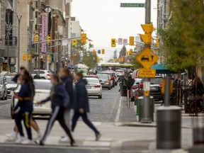 Traffic moves along Dundas Place in London on Thursday, Oct. 28, 2021.  London civic works committee will consider limiting traffic on the flex street again next spring and summer.(Mike Hensen/The London Free Press)