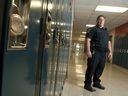 This 2012 photo from the LFP Archives shows London police Const.  Josh Kenny as he served as the school resource officer at St. Thomas Aquinas in the west end of the city.  Craig Glover/The London Free Press