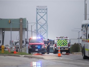Windsor police investigate after possible explosives were found in a vehicle at the inspections area of the Ambassador Bridge in Windsor Monday. (Dax Melmer/Postmedia Network)