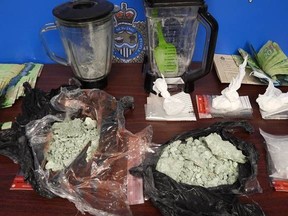 Sarnia police provided this photo of items allegedly seized during a search Saturday of an address in the city by officers involved in a drug trafficking investigation.