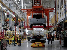 A Ford electric F-150 truck prototype is assembled at the Rouge Electric Vehicle Center in Dearborn, Mich. in September. (Rebecca Cook/Reuters)