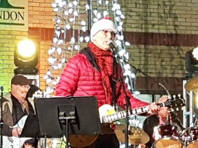 Doug Varty and the Rocking Reindeer open the lighting of the lights ceremony with their rendition of I Saw Mommy Kissing Santa Claus Friday evening at Victoria Park in downtown London. (DAN BROWN, The London Free Press)