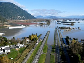 The Trans Canada highway is cut off by flood water over farmland near Abbottsford, B.C., after rainstorms lashed the province last week.  (Jennifer Gauthier/Reuters)