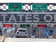 A Quebec registered car heads toward the one open lane to enter the United States at the Lacolle border crossing.