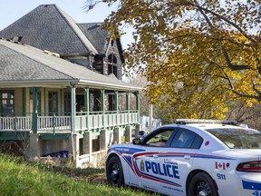 London police and fire investigators continue their probe Monday of a suspicious $1-million blaze that damaged the clubhouse at the City of London's shuttered River Road golf course on the weekend. (Derek Ruttan/The London Free Press)