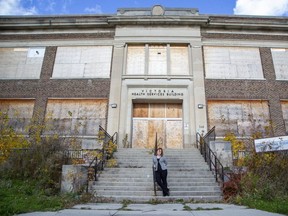Michelle Hamilton, a public history professor at Western University, stands outside the old building on the South Street hospital lands that once was home to Western's medical faculty in London on Friday November 12, 2021. (Derek Ruttan/The London Free Press)
