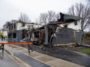 Morrice Furniture, a family-owned store on Simcoe Street in Tillsonburg , Ontario, was destroyed by fire yesterday. It has been in business since 1948. (Derek Ruttan/The London Free Press)
