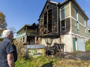 Shawn Davis of the London Fire Department says damage to the River Road golf club clubhouse "could easily reach $1 million" after a fire Sunday morning. Davis says the back end of the building was ablaze when crews arrived and that the entire cathedral portion of the clubhouse would have to come down due to fire-damaged beams in the roof. Photograph taken on Sunday November 7, 2021. Mike Hensen/The London Free Press/Postmedia Network