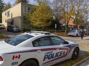 London police officers responding to a disturbance Thursday morning at 69 Cartwright St., in London's Woodfield neighbourhood, found the body of a man in a unit. Kenneth Cardiff, 42, of London, is charged with second-degree murder. Court records identify the victim as John Flores, who lived in the building. (Mike Hensen/The London Free Press)