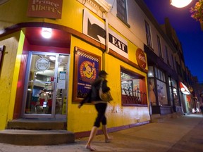 A woman walks by Prince Albert's Diner along Richmond Street in this 2012 LFP Archives photo. (File photo)