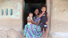 A mother is shown with her two sons in India. Supplied