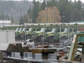 Canadian Armed Forces trucks parked at an armoury in Chilliwack in the midst of B.C.'s flooding.