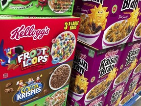 Boxes of Kellogg's cereals including Froot Loops, Cocoa Krispies and Raisin Bran are seen at a store in Arlington, Virginia, December 1, 2016. Kellogg's is facing a boycott organized by the Trump-aligned Breitbart News after the cereal giant decided to pull its advertising from the website. In the latest clash over corporate marketing and politics, Breitbart called on its readers to stop buying Kellogg's products to protest the company's "act of discrimination and intense prejudice."  / AFP / SAUL LOEB        (Photo credit should read SAUL LOEB/AFP/Getty Images) ORG XMIT: SAL021