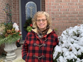 Born on Christmas Day, it's no surprise London's Wendy Clewley, teacher for 35 years and grandmother of eight,  loves to embrace the season decorating her property on Optimist Park Drive. And a reminder to all to keep natural wreaths and garlands moist until frost sets in.
(BARBARA TAYLOR/The London Free Press)