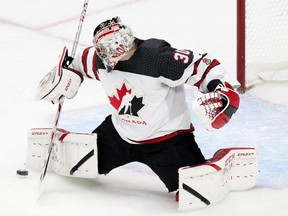 Team Canada goalie Brett Brochu of Tilbury makes a save against Team Austria during the second period of a round-robin game at the IIHF world junior hockey championship Tuesday in Edmonton. (David Bloom photo)