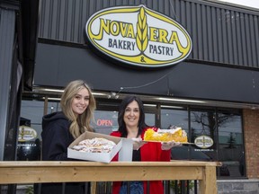 Paula Da Silva, right, and her daughter Raquel Da Silva own Nova Era Bakery in London along with their son and brother Jordan. The business has done well enough during the pandemic to look at expanding, but restrictions due to Omicron have made those plans more challenging. (Derek Ruttan/The London Free Press)