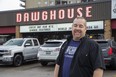 Dick Price is a co-owner of Dawghouse, a restaurant on Wilkins Street.  Price's partner, Chuck Thompson, told The Free Press the increase in minimum wage for wait staff is an additional expense at a tough time. “Our capacity is at 50 per cent, but they still make decent money earning tax-free money,” Thompson said of wait staff and bartenders earning tips. . (Derek Ruttan/The London Free Press)