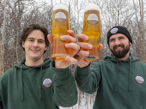 Colin Gunn and Myles Rombough, partners in 4EST Brewery, donate four per cent of proceeds to tree-planting initiatives in the Forest City. The pair are pictured in London, Ont.  on Wednesday, Dec. 8, 2021. (Mike Hensen/The London Free Press)