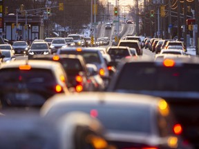 Traffic is heavy westbound on Oxford Street approaching Wharncliffe Road in London on Wednesday, Dec. 8, 2021.  (Mike Hensen/The London Free Press)