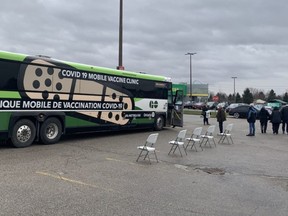 COVID-19 vaccine seekers wait in line at the GO-Vaxx clinic in Pond Mills Saturday. The walk-in clinic had 100 pediatric doses and 120 COVID-19 vaccine doses for people 12 and older aboard.