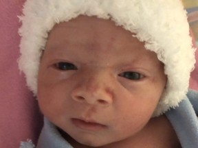 Weighing six pounds and eight ounces, Niall Ivan Monis was born at Victoria Hospital one minute after the countdown to the new year. He is the first 2022 baby in London. (Supplied photo)