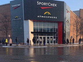 People lined up around the exterior of Masonville Place mall as government officials doled out hard-to-find COVID-19 rapid tests. The doors opened at 9 a.m. and the line was gone within an hour. Photo taken Thursday Jan. 6, 2022. (Norman De Bono/The London Free Press)