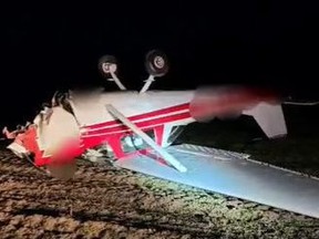 A pilot suffered minor injuries after landing his plane in a farmer's field off Windham Road 13 in Norfolk County Sunday afternoon. (Norfolk OPP via Twitter)