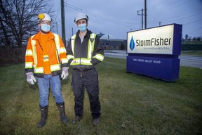 Spencer Templeton, left, is an operator and Matthew Agostinelli is a millwright apprentice at at StormFisher Evironmental in London. The biogas company is now Canada's largest food-waste diversion plant after a recent expansion. (Derek Ruttan/The London Free Press)