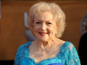 FILE PHOTO: Lifetime Achievement honouree Betty White arrives at the 16th annual Screen Actors Guild Awards in Los Angeles, California, U.S. January 23, 2010. REUTERS/Phil McCarten/File Photo