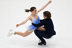 Canada's Evelyn Walsh and Trennt Michaud perform during the pairs free skating event of the ISU Four Continents Figure Skating Championships in Tallinn on January 22, 2022. (Photo by Daniel MIHAILESCU / AFP)