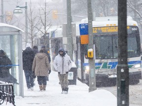 An London Transit bus stops at Queens Avenue and Richmond Street on Monday. The London Transit Commission will be asked to sign off on its 2022 roadmap on Wednesday. (Derek Ruttan/The London Free Press)