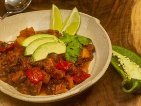 Meatless quash and black bean chili packs a smoky, slightly spicy flavour that pairs well with sides such as avocado, cilantro and lime, Jill Wilcox says. (Food Styling by Ran Ai)(Mike Hensen/The London Free Press)
