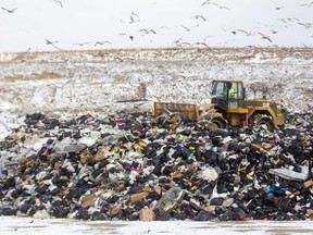 A trash compactor moves garbage at the City of London landfill site on Manning Drive Thursday, Jan. 6, 2022. The site is running out of capacity sooner than expected, while provincial approval of an expansion will take longer.  (Mike Hensen/The London Free Press)