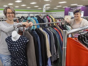 Lorraine Hamstra, left, manager of the new Mission Thrift Store on Wharncliffe Road South in London, and Jonelle Mace, general manager of Mission Thrift Store, Jprepare for the location to open. The COVID-19 pandemic and an increase in customers at its north London store prompted the agency to act on its plans to open a second location, Mace said. (Mike Hensen/The London Free Press)