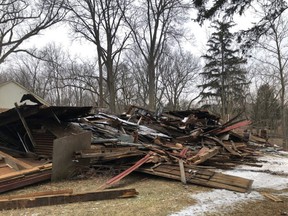The owner of a historic barn at 247 Halls Mills Rd. in Byron that was demolished under the cover of darkness in 2019 was fined $2,000 after he pleaded guilty to a charge under the Ontario Heritage Act. But the rubble remains while the city and owner try to come to an "appropriate mechanism to address the remains,” city hall's building director Peter Kokkoros said.(London Free Press file photo)