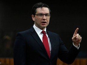 Conservative MP Pierre Poilievre rises during Question Period in the House of Commons on Parliament Hill in Ottawa on Friday, April 16, 2021