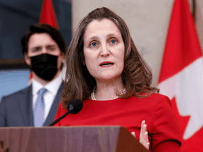 Finance Minister Chrystia Freeland with Prime Minister Justin Trudeau at a news conference on January 26, 2022.