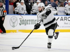 Los Angeles Kings defenseman Drew Doughty shoots against the New York Islanders on Jan. 27, 2022. This was Doughty's 1,000th NHL game. Brad Penner-USA TODAY Sports