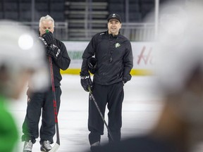 London Knights coaches Dale Hunter (left) and Dylan Hunter during team practice at Budweiser Gardens. File photo