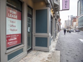 A for lease sign in a Dundas Street shop window in downtown London. (Derek Ruttan/The London Free Press)