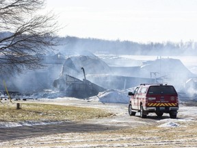 Egremont Road was closed for a time as firefighters put out a barn fire at 8519 Egremont Road in Watford. on Thursday February 24, 2022. Derek Ruttan/The London Free Press/Postmedia Network