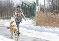 Sally Macrae walks with her dog Molly in east London on Thursday February 24, 2022. City hall is planning to extend the Thames Valley Parkway from the Meadowlilly Road pedestrian bridge to link with City Wide Sports Park and surrounding high-growth areas. (Derek Ruttan/The London Free Press)